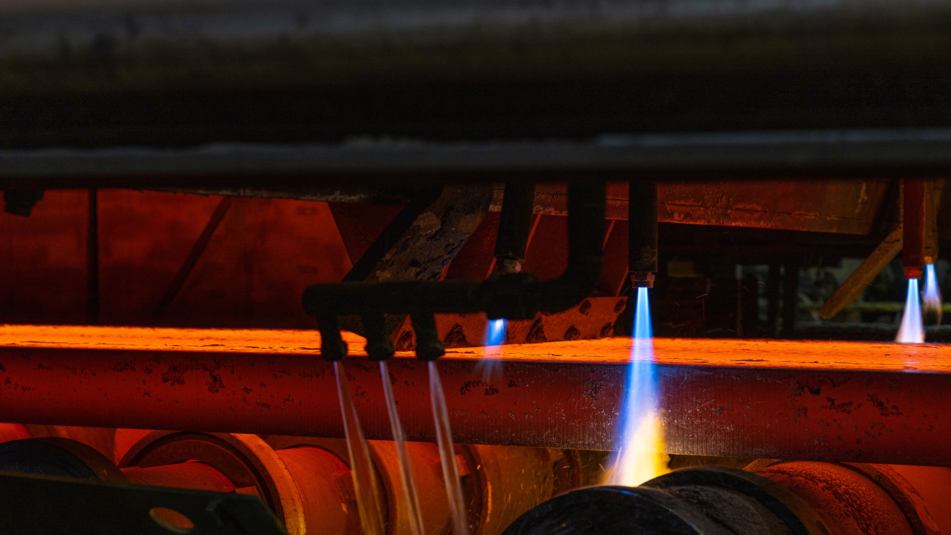 Cutting the slabs as they come out of casting with natural with renewable natural gas.