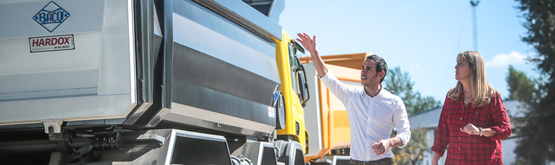 Employees at Industrias Baco admiring a tipper truck made in Hardox 500 Tuf steel.