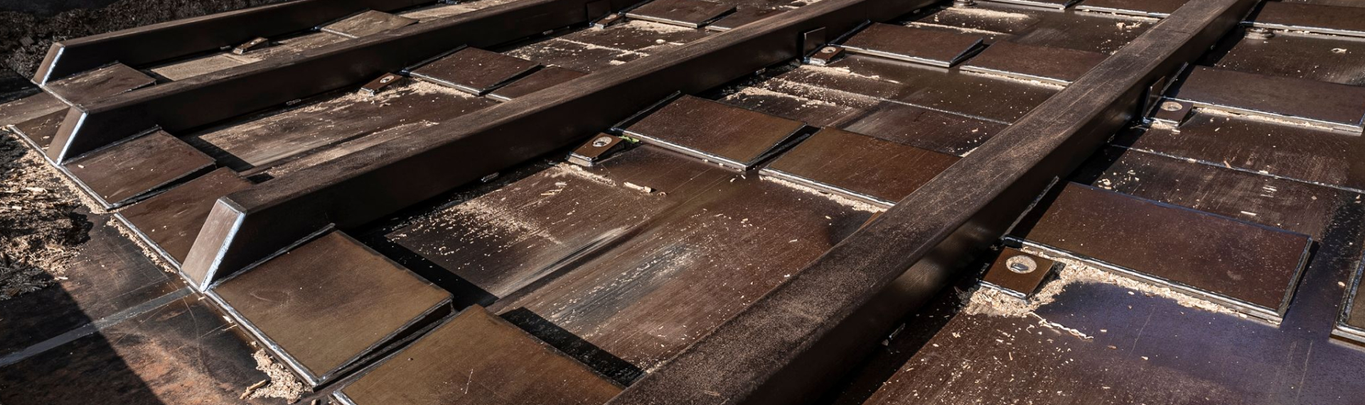 Part of a loading bay at a biomass district heating plant made in corrosion resistant Hardox® HiAce steel.