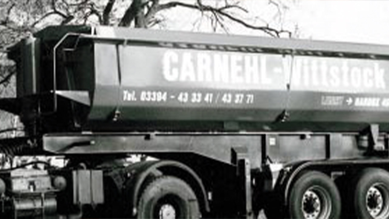 Black and white photo of a truck body from the German company Carneh.